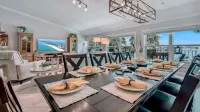 Updated - Dolphins - MOM Clean - Waterfront- Lux 4 Bedroom / 3 Bath (Unit #203)