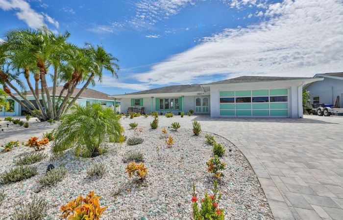 Spacious waterfront home in Apollo Beach w/ private swimming pool and boat dock.