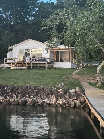 Lakefront home on the main channel w/ beautiful view and a boat ramp next door!