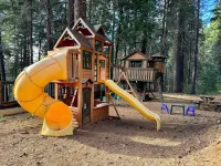 NEW! Luxury Cabin W/Deck, views & Playground! Pool, Slots, Fun, Snow !