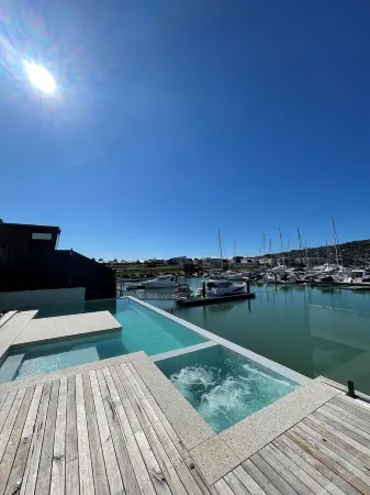 Stunning Luxury Waterfront Retreat – Sleeps 12, Pool, Spa & Entertainment Galore