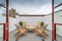 Carmel-By-The-Sea~~   Corner of Mission & 7th. ~~    2 Bedroom Luxury Apartment