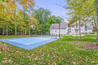 Lakeview home with private pickleball court, firepits, fireplace, & full kitchen