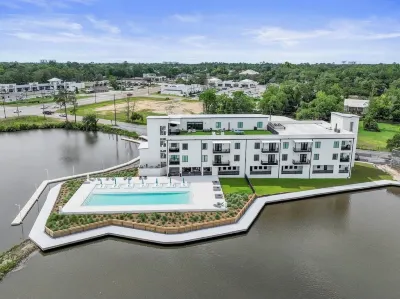 Handsboro Pointe Condo & Suites Hotels near Bayou Bluff Tennis Club