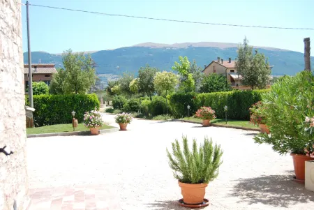 Agriturismo"Il Sagrato di Assisi" Appartamenti,Camere