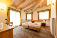 Alpine Mugon Hotel