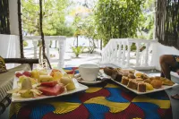 Moonshine Uroa Boutique Hotel - breakfast