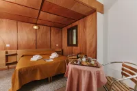 Villaggio Camping Torre Del Porticciolo Hoteles en Alguer