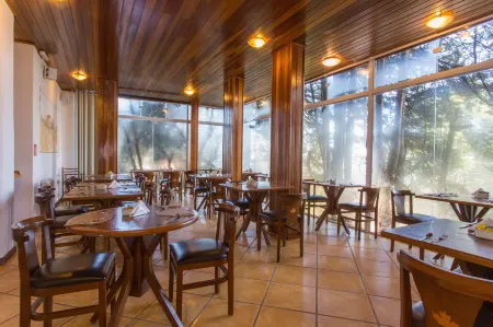 Pousada la Toscana Campos do Jordão Отели рядом с достопримечательностью «Casa - Chalé Condomínio Estância das Águas Claras»