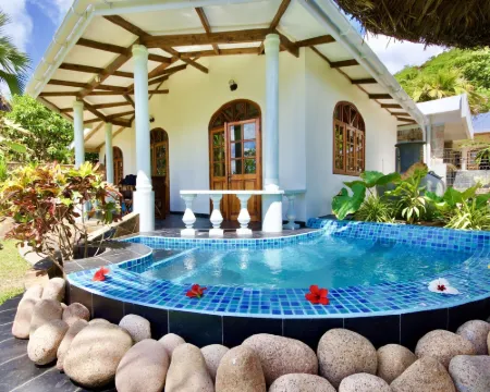 La Petite Maison and Sea Splash Hotels in Praslin Island