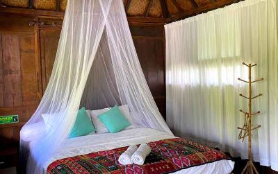 Rumah Lumbung Max Checkin 10Pm Ethnic Room at Omah Limasan by Omah Bungah Photo