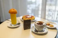 神聖的酒店 - 早餐