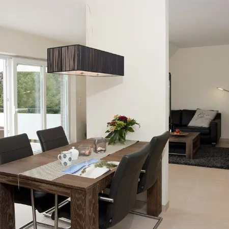 Exclusive 5-star vacation apartment in a top location, with sauna, fireplace & large balcony.