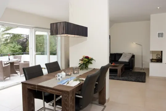 Exclusive 5-star vacation apartment in a top location, with sauna, fireplace & large balcony.