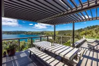 Designer living with stunning views across the bay, a spa and coast walks.