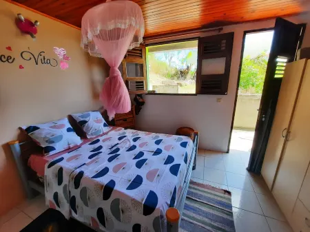 Pleasant, comfortable F2 in Anses d'Arlet, Petite-Anse. Отели в г. Лез Анс-д'Арле