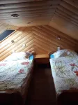 Sunny holiday home with a cozy sleeping loft, idyllically located in the garden.