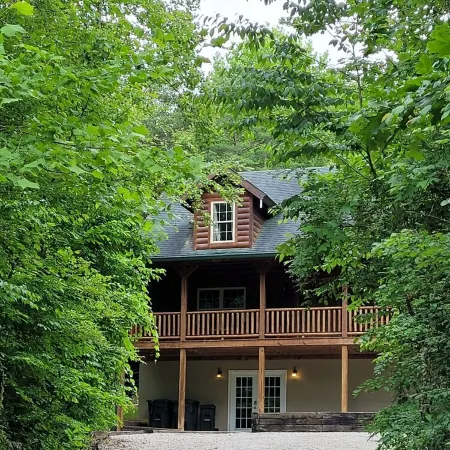Secluded cozy cabin nestled among the hemlocks and rock formations in Hocking