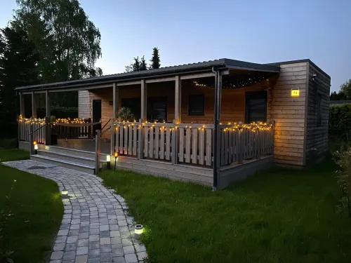 Great vacation home Rybak with box spring beds and large covered terrace