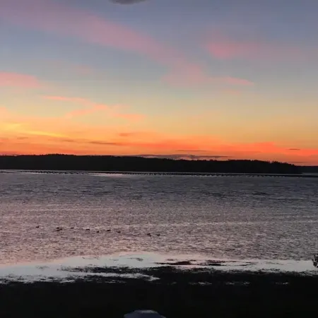 Wake up to the Sunrise in This Renovated Ocean-front Cottage!!