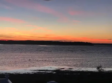 Wake up to the Sunrise in This Renovated Ocean-front Cottage!!