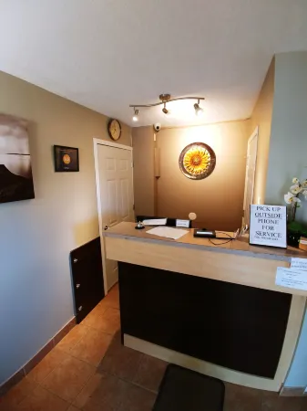 Sundown Motel Отели в г. Маниту Бич