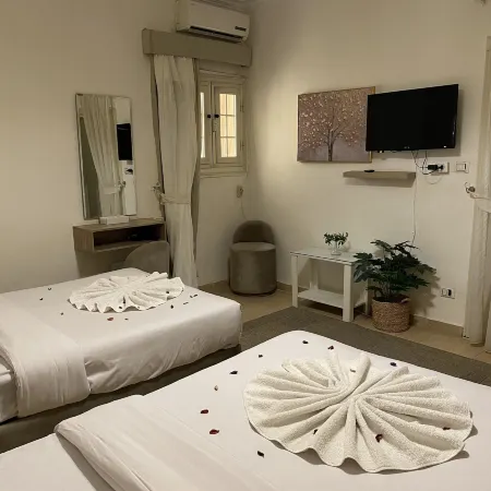 Seven Pyramids View Inn Отели рядом с достопримечательностью «Большой сфинкс»