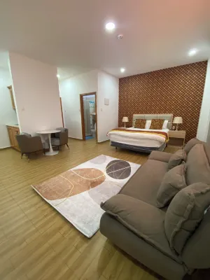 July Apartments
