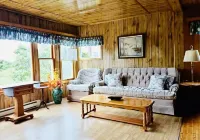 Pine Cottages Hotels in Queens County
