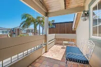 Oceanfront Home Walk to Balboa Pier + Scenic Views Balboa Peninsula Point by Avantstay