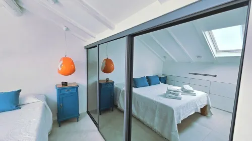 The Attic Room on Niella Street, in the city center and near the sea