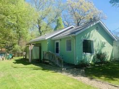 A cozy cottage tucked away in the heart of Union Pier!
