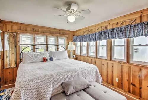Beachfront Sebago Cottage w/ Deck + Grill! - balcony
