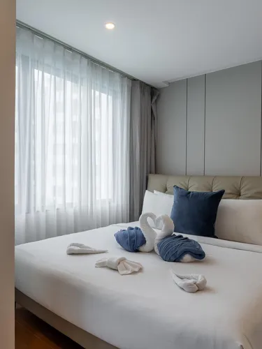 รูปภาพของStylish pool view apartment at Capri Condo