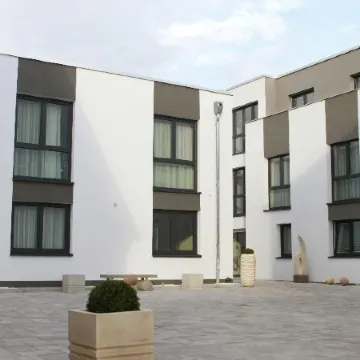 Naam Hotel & Apartments Frankfurt City-Messe Airport Отели рядом с достопримечательностью «Нидеррад»