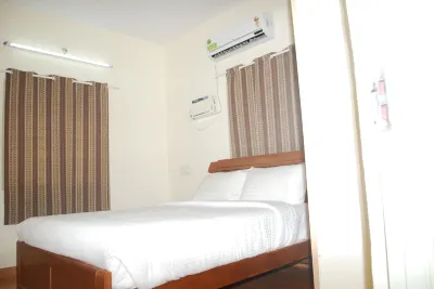 Aditya Holiday Homes Các khách sạn gần Arulmigu Oppiliappan Temple
