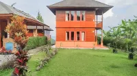 RedDoorz Syariah Near Tugu Macan Kayu Aro Отели в г. 