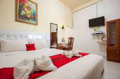 RedDoorz Syariah near Tirtasari Sonsang dan Banto  Hotel dekat Surau Nurussalam