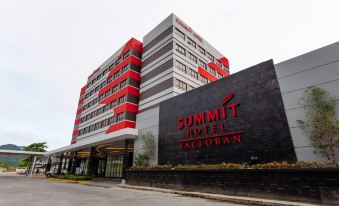 "a modern hotel building with a black and red sign that reads "" summit hotel tacloban "" in front of it" at Summit Hotel Tacloban