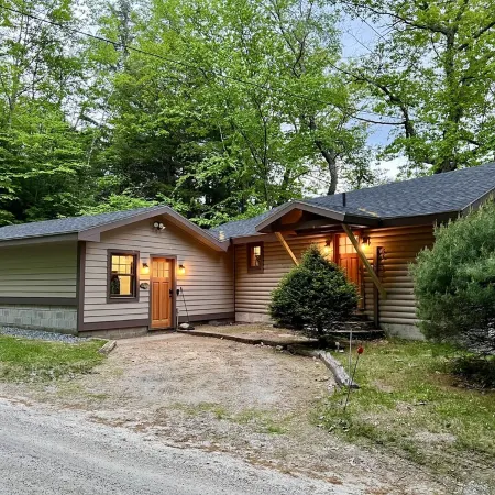 Lakefront cabin with dock, hot tub, fire pit!!