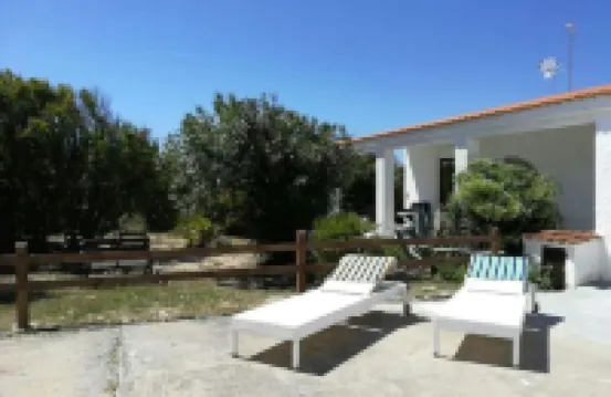 Villa at 20 m. from the sea on the beautiful and unspoiled beach of Carratois