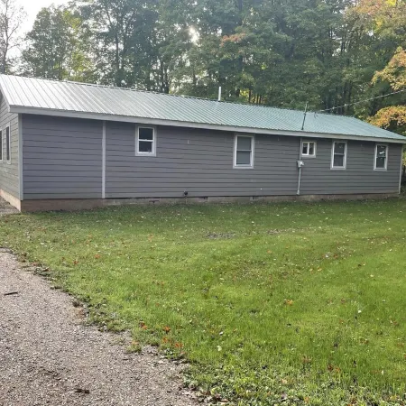 UP Riverfront Cabin with rustic charm & modern amenities. Great for families!