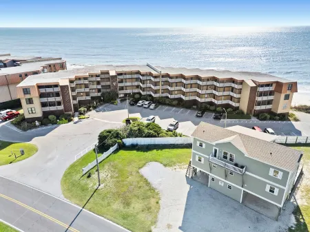 The Pink Pearl - Top Floor Beachfront Boho Condo with Community Pool!