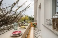 Holiday apartment with a special flair, view of the mountains and close to the lake.