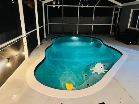 Amazing heated pool 4 BR/2 baths newly renovated home with large deck!