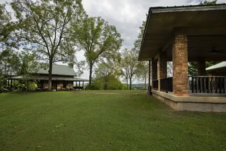 Historic Log Cabin on 200 acre farm, pasture and forest with panoramic views!