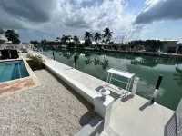 Brand New '23 Canal Home - 3BR/3BA, Sleeps 8, with Pool, 50' Dock, & Cabana Club