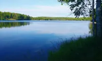 Beautiful newer home on the sunny side of peaceful Camp Lake in Iron River