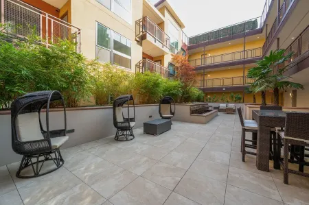 Pets Stay Free • King Bed • Walk to Downtown • Garage Parking • Elevator