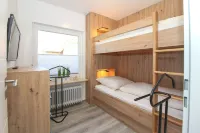 Ferienhaus Dünentraum II: Helles Reihenhaus für 4 Personen + Baby